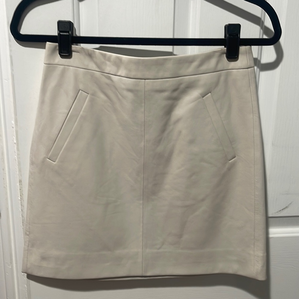 J Crew mini leather skirt. Never worn, still has tags.